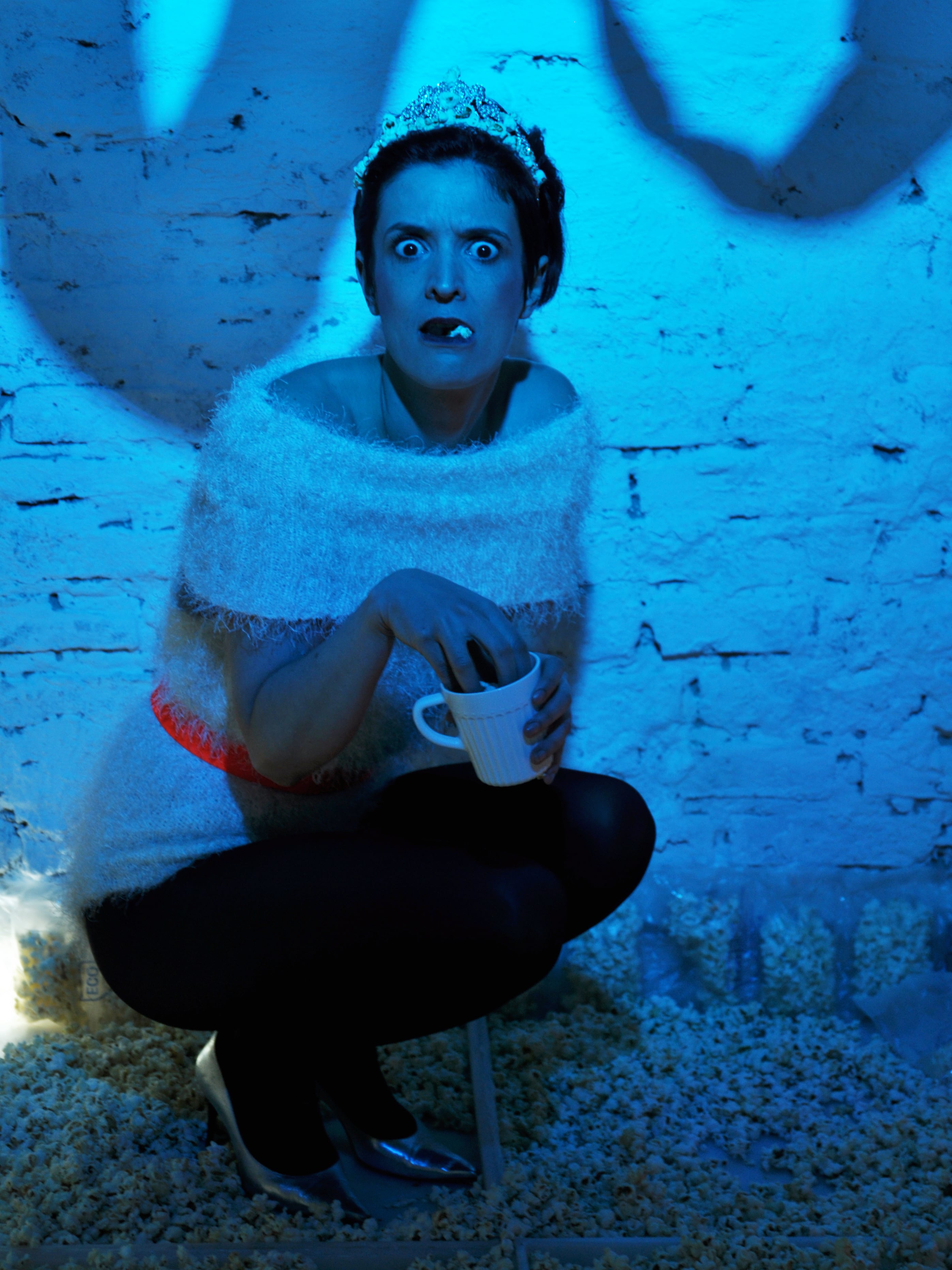 actress eating popcorns